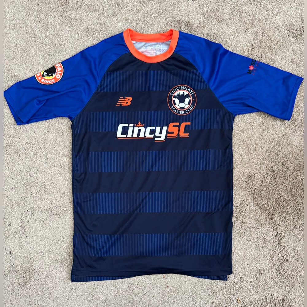 CINCINNATI (CINCY SOCCER CLUB) New Balance Blue and Orange Soccer Jersey.